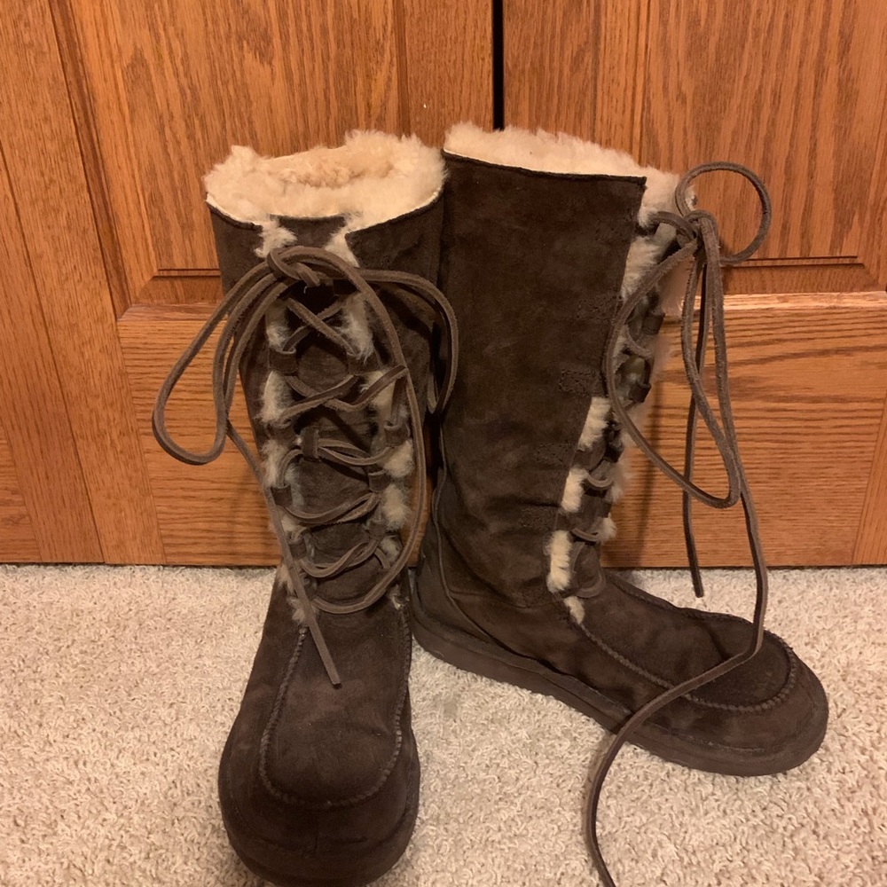 Used Ugg knee high laced boots in good condition